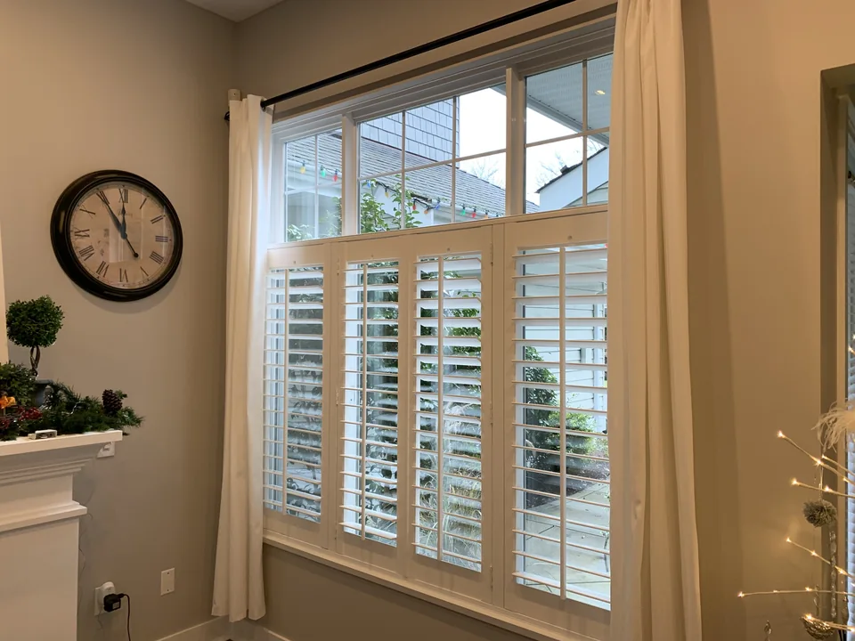Framed panels beneath a clear transom